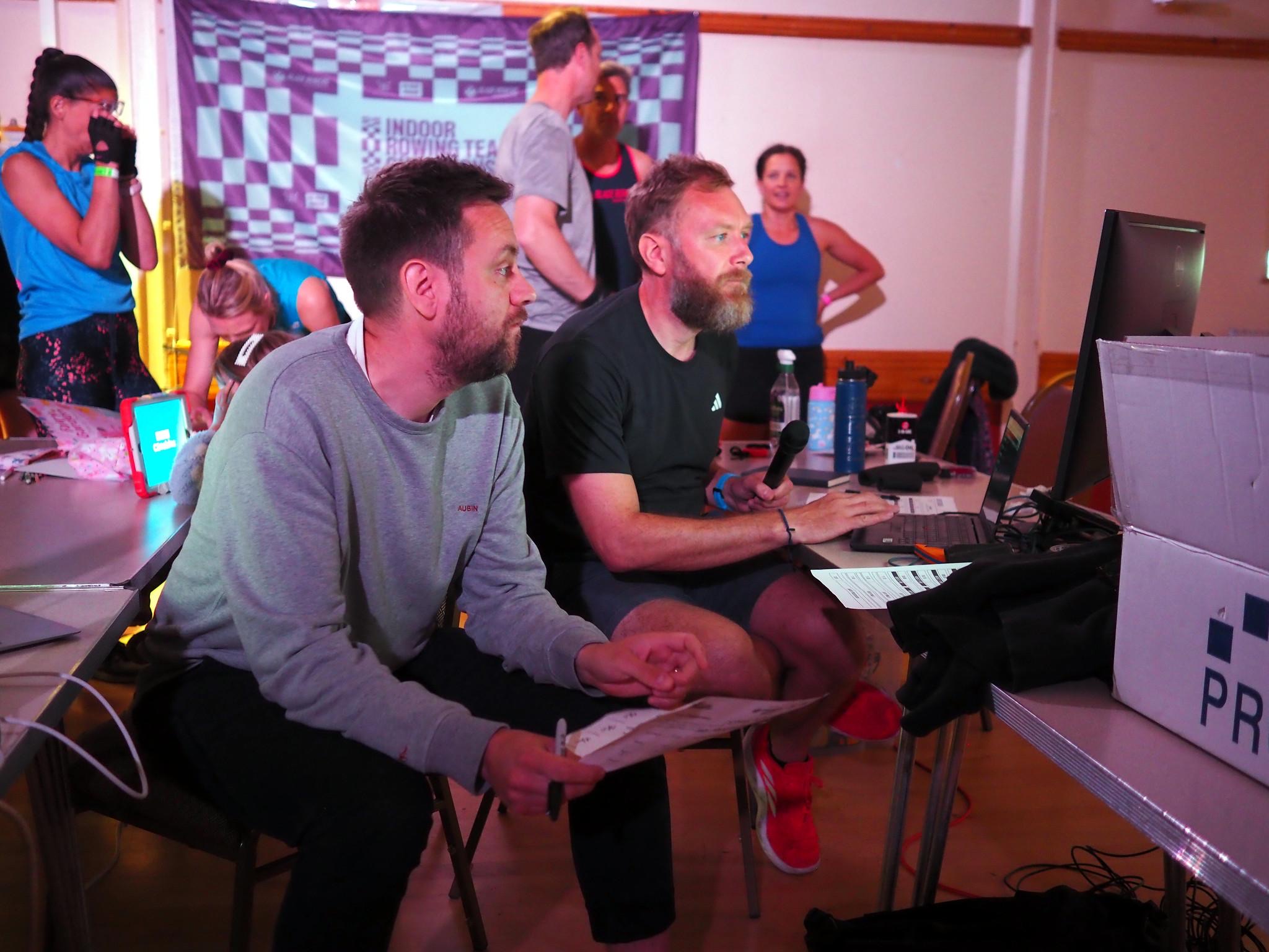 Rob and a fellow official following a race from the desk