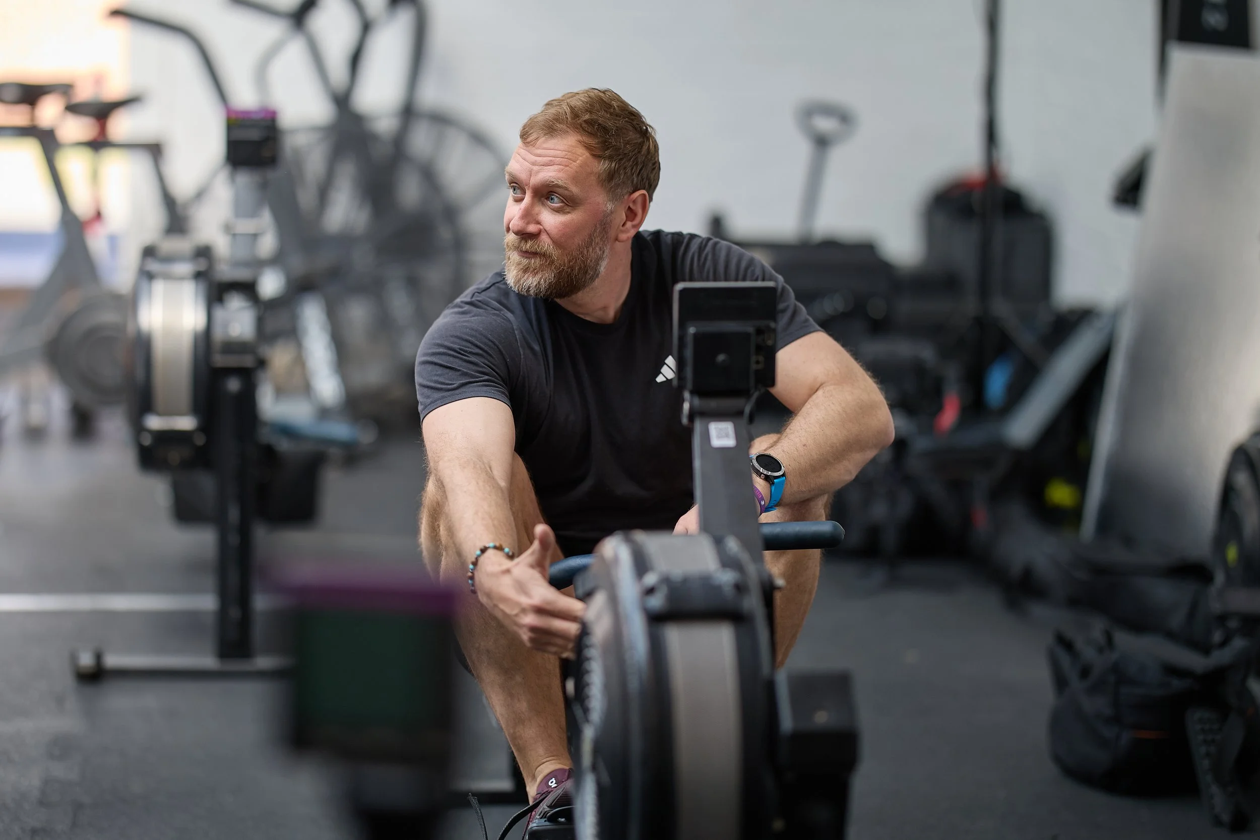 Rower mid-stroke during a training session