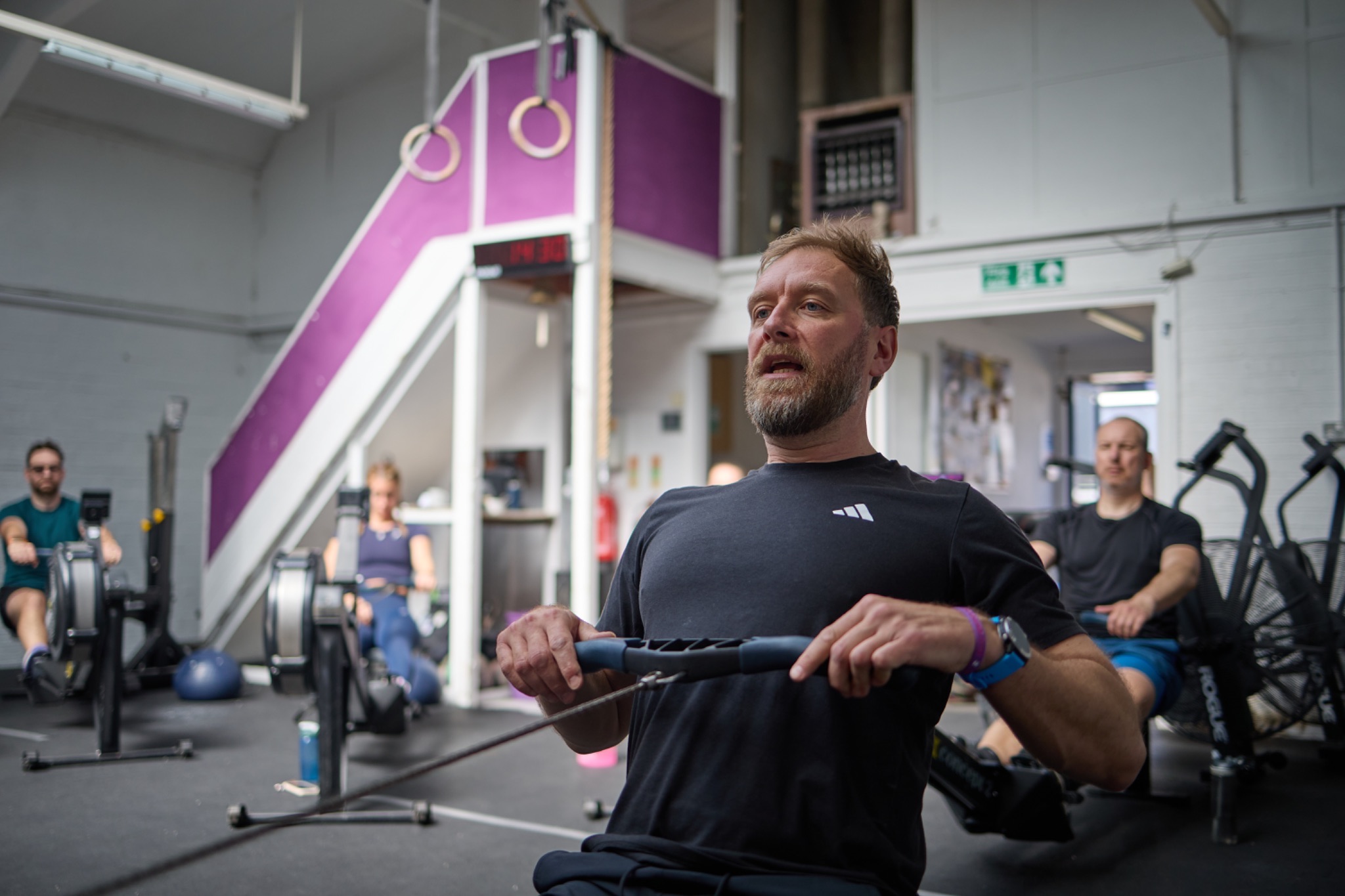 Rob rowing at the finish of the stroke during a session